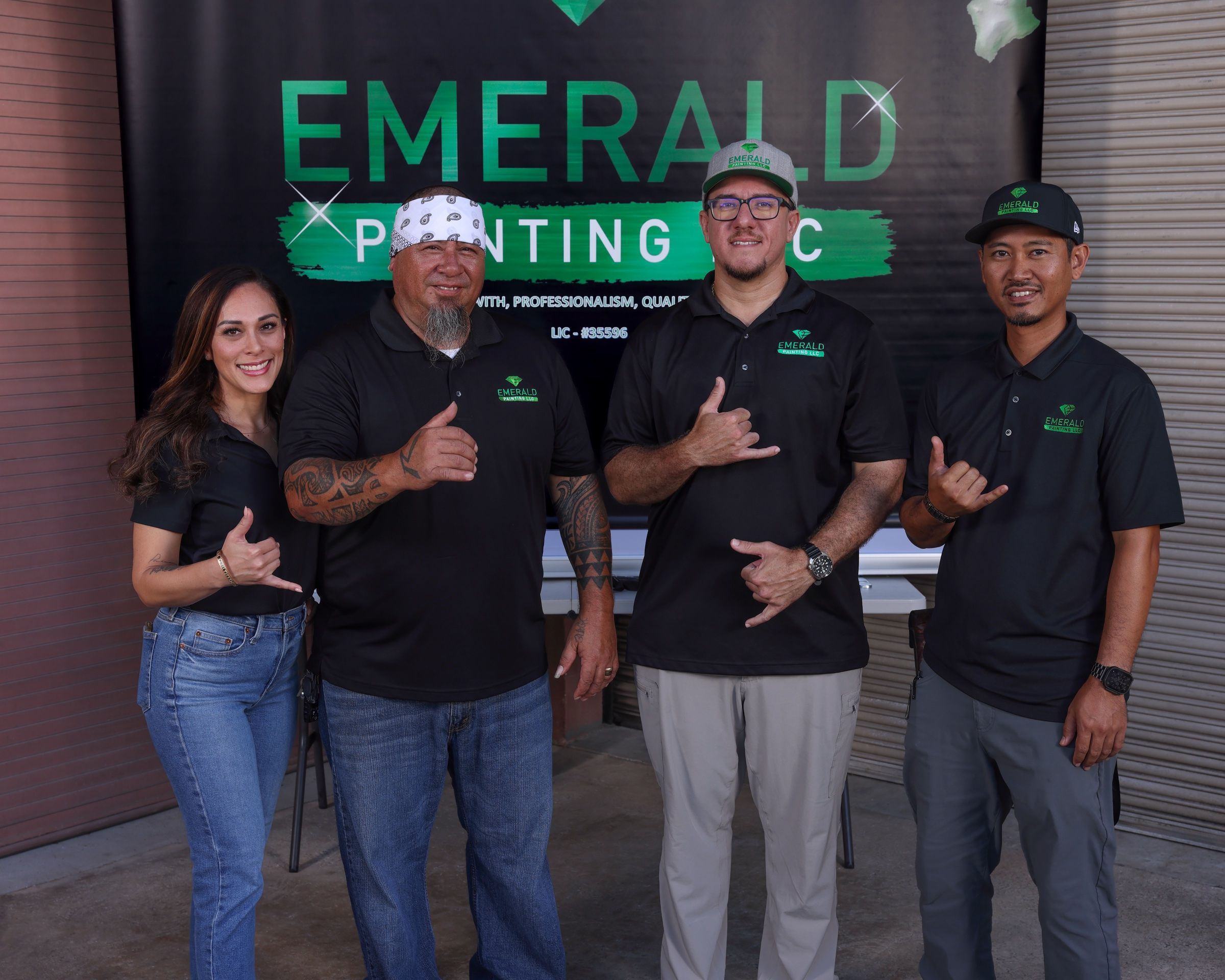 Emerald Painting’s four leaders, laughing, throwing shakas